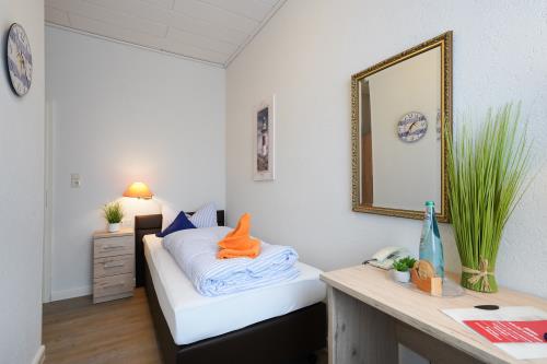 Borkum Hotel Windrose - EZ klein 7 - 2019 Berg Hotel Windrose 1034