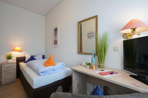 Borkum Hotel Windrose - EZ klein 7 - 2019 Berg Hotel Windrose 1027