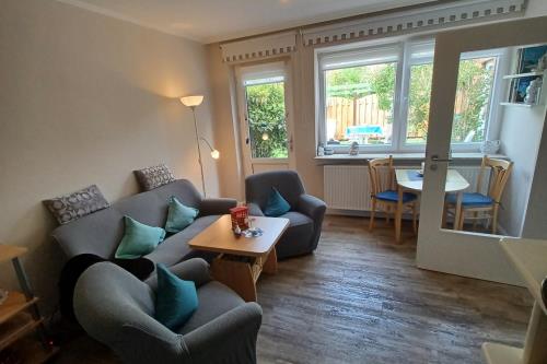 Borkum Ferienwohnung LÜTTJE HUNK - Wohnzimer mit Sitzecke