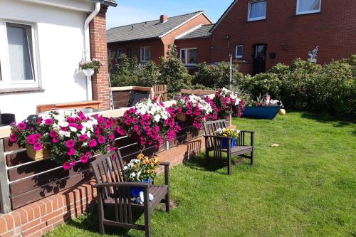 Borkum Ferienwohnung Seehundsbank - Haus Garten