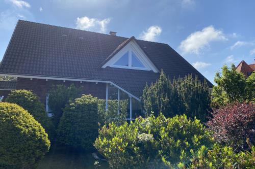 Borkum Ferienwohnung Top Lounge Borkum - Gartenansicht