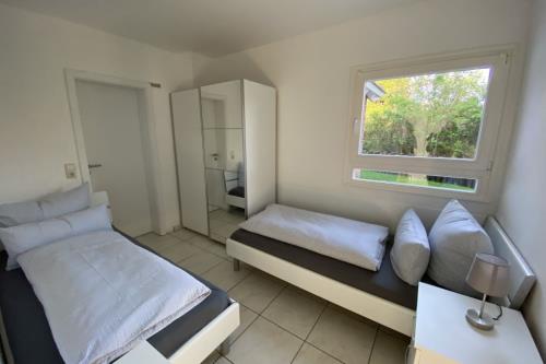 Borkum Ferienwohnung Top Lounge Borkum - Top Lounge I - Schlafzimmer mit Rolläden