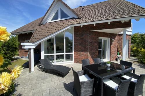 Borkum Ferienwohnung Top Lounge Borkum - Top Lounge I - Terrassen Ansicht vom Garten