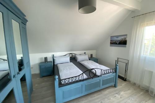 Borkum Ferienwohnung Top Lounge Borkum - Top Lounge II - Schlafzimmer mit einem Doppelbett