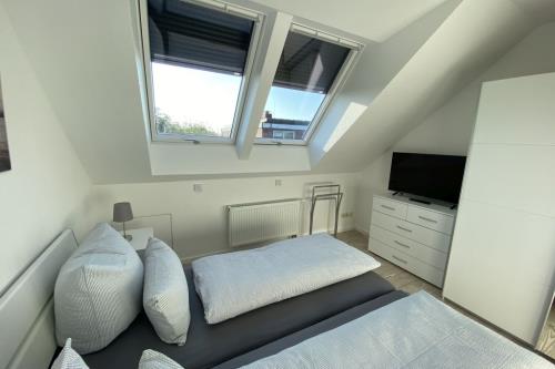 Borkum Ferienwohnung Top Lounge Borkum - Top Lounge II - Schlafzimmer mit Rolläden, Dünen Lounge