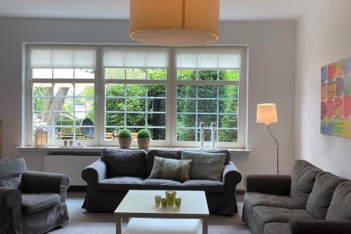 Borkum Ferienhaus Villa Elysée - Wohnzimmer EG