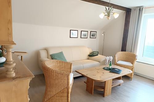 Borkum Ferienwohnung Villa Harmonie - Wohnung Jasmin - Wohnzimmer