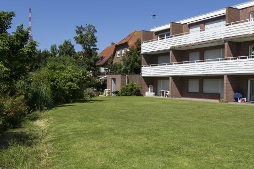 Borkum Ferienwohnung am Südstrand - Ruhige Hausrückseite