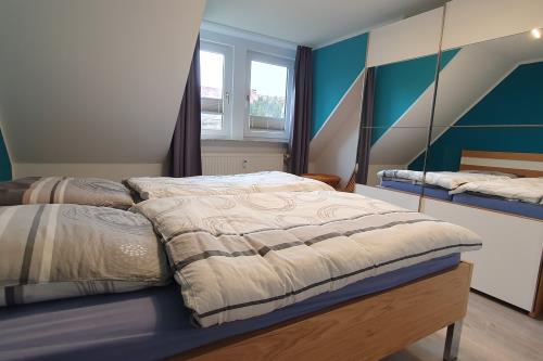 Borkum Ferienwohnung Haus Heike - Schlafzimmer 1