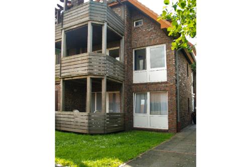 Borkum Ferienwohnung Nei ut - Hauansicht Rückseite