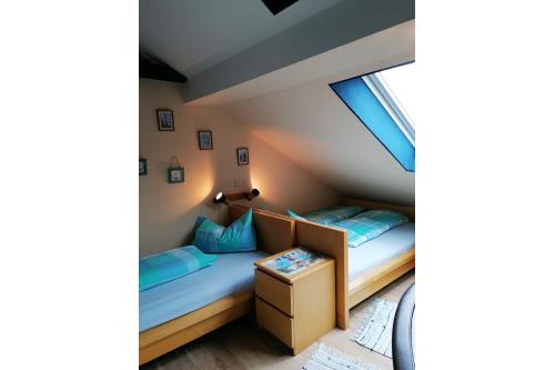 Borkum Ferienwohnung Oskar - Schlafzimmer