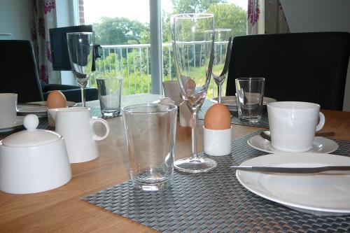 Borkum Ferienwohnung Sternenblick Borkum - Frühstück mit Blick ins Grüne