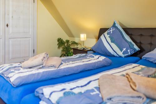 Borkum Ferienwohnung Trientje / Haus Leuchtturmkieker - Schlafzimmer