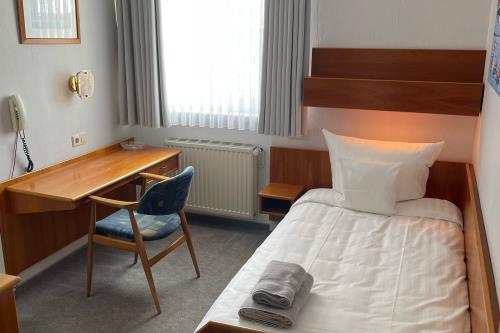 Borkum Hotel Haus Passat - Einzelzimmer 02 EG - 02 EG - Einzelbett