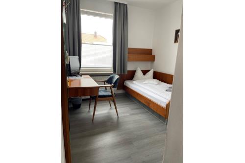 Borkum Hotel Haus Passat - Einzelzimmer 06 EG - 06 EG - Einzelbett