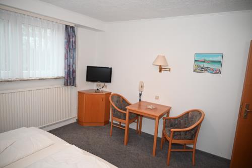 Borkum Hotel Haus Passat - Familienzimmer 18 UG - Sitzgruppe